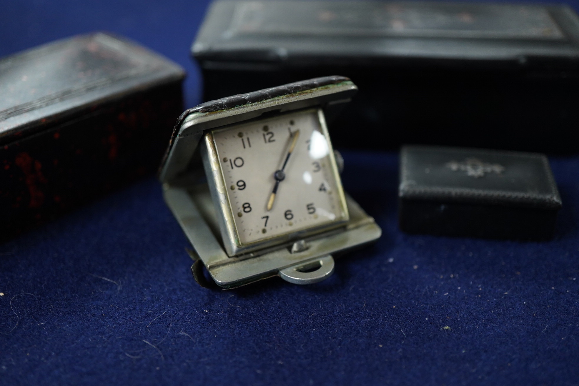 Three Georgian Snuff boxes and a timepiece.